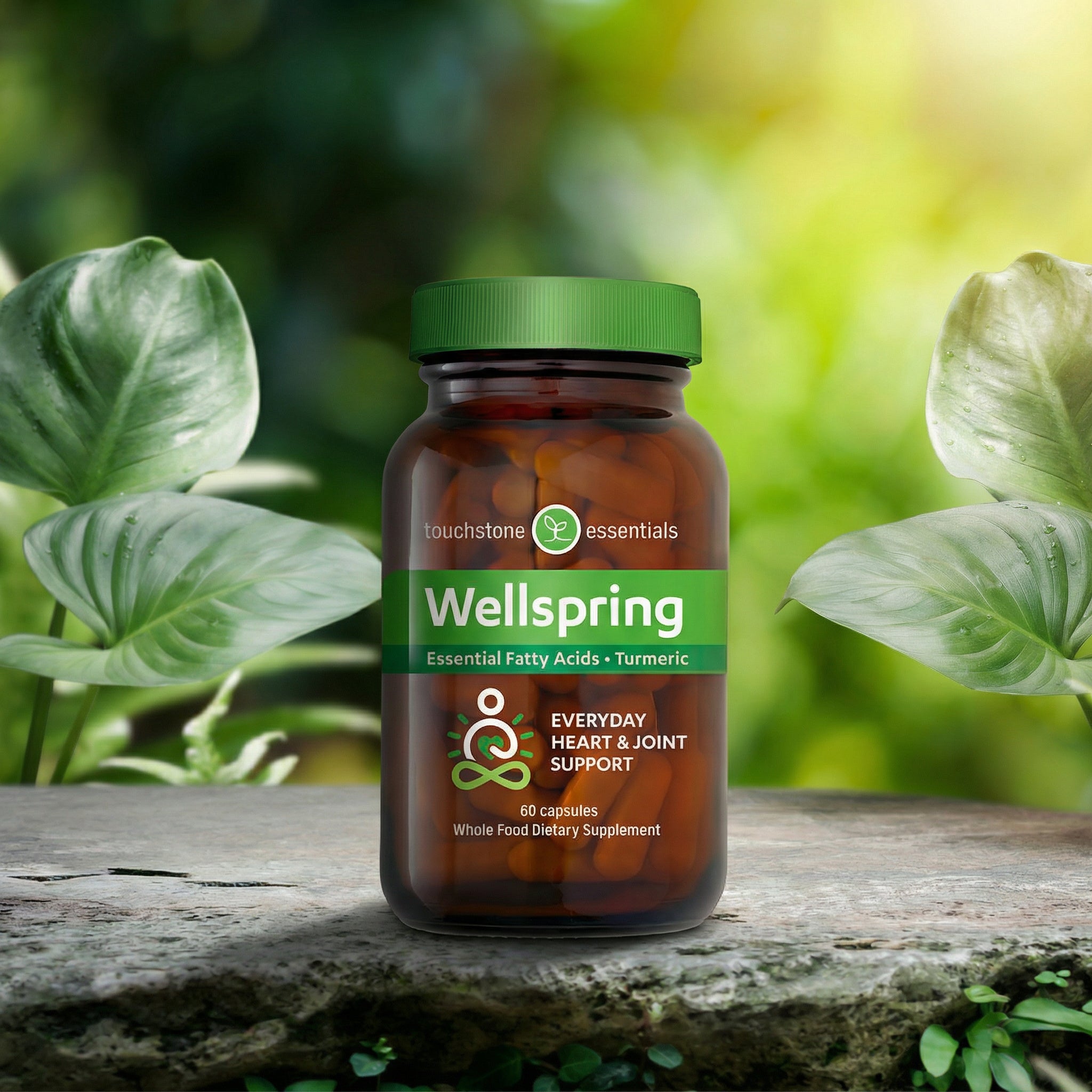 Bottle of Wellspring supplement on a wooden surface with green foliage in the background