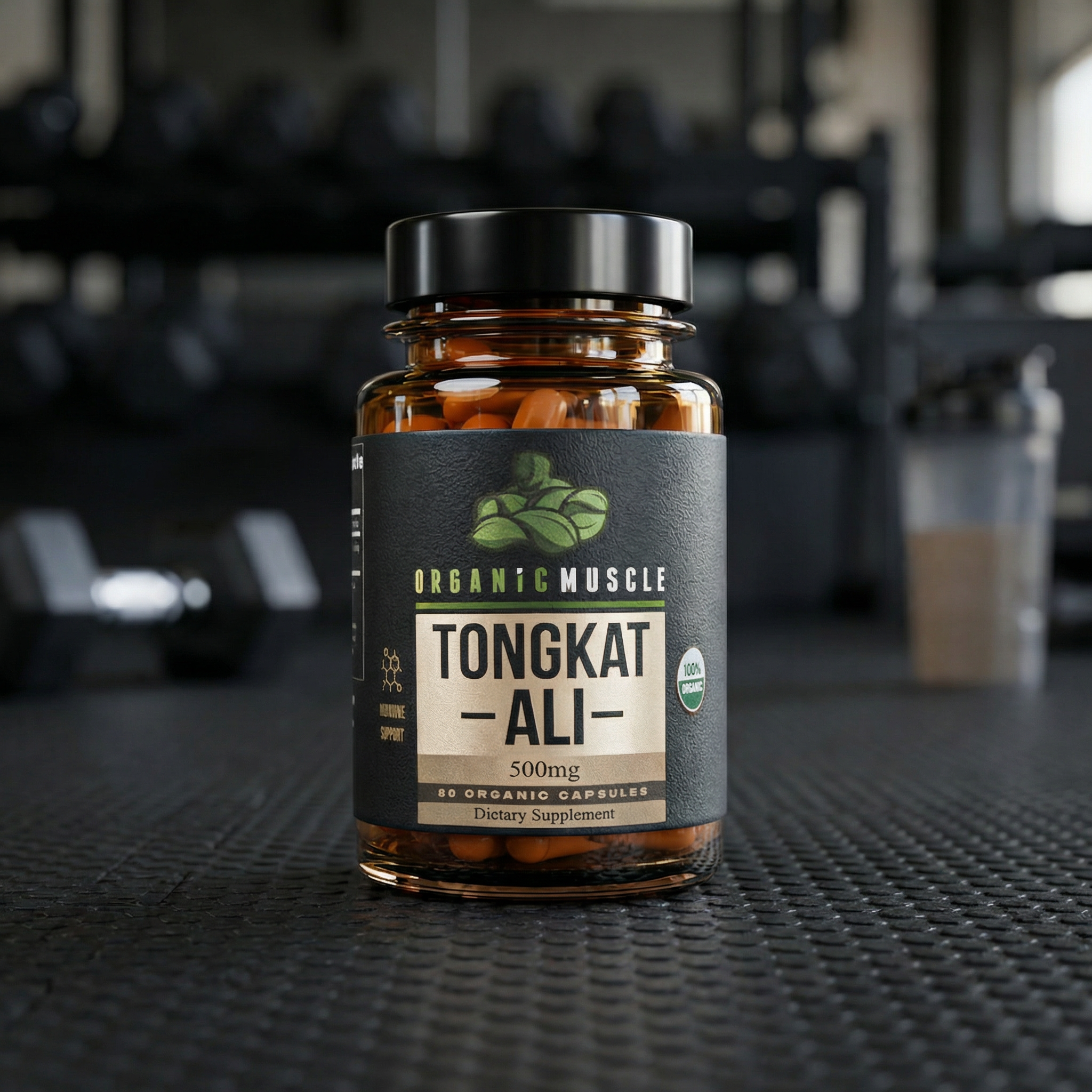Supplement bottle labeled 'Tongkat Ali' on a gym bench with blurred gym equipment in the background